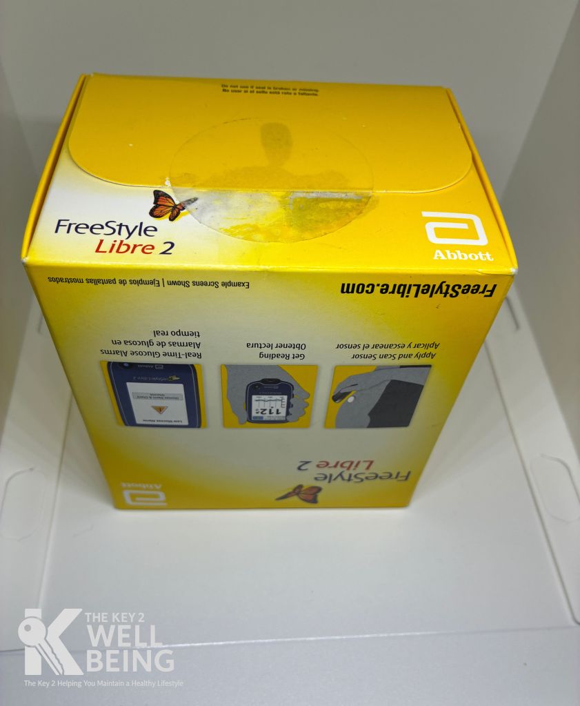 FreeStyle Libre 2 CGM sensor box with broken tamper seal — example of rejected diabetic supply packaging due to compromised integrity at The Key 2 Wellbeing