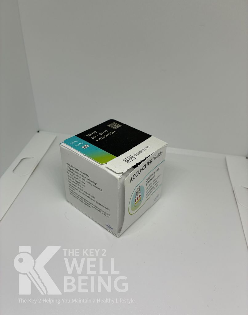 Accu-Chek Guide test strip box with ripped corner and black pharmacy label — example of damaged diabetic supply packaging for buyback condition guide